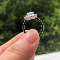 /public/photos/live/Elongated Cushion Cut Baguette Halo Green Moissanite Engagement Ring 779 (2).webp